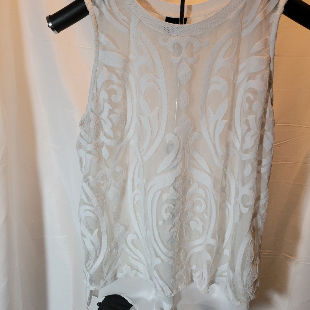 #1325 sheer lined open back top.